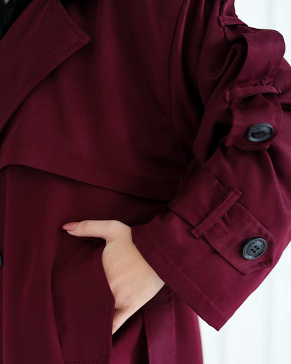 Trench coat in burgundy